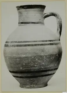 Jug with a single loop handle and dark horizontal bands, from Marion