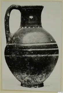Jug with a loop handle and three pale horizontal bands around the body, from Marion