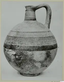 Pottery Bichrome IV jug from Marion, with a single strap handle and painted bands around the body