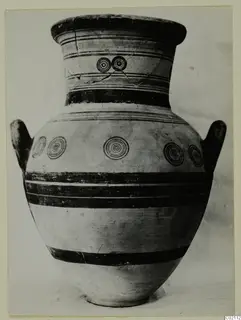 Painted pottery vessel from the Marion tomb finds, with two handles, horizontal bands and concentric circles