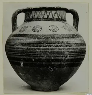 Two-handled pottery vessel, Pottery Bichrome IV amphora-crater, with concentric circles and horizontal bands.