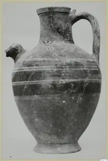 Pottery jug with an animal-head spout and painted bands, from Marion
