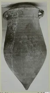Pottery Plain White IV-V vessel from Marion, pointed base and two loop handles at the shoulder, shown upright