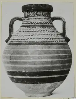 Pottery Bichrome V, a two-handled jar with concentric circles at the neck and wavy and horizontal bands on the body.