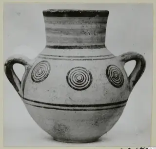 Two-handled bichrome pottery jar decorated with concentric circles and dark horizontal bands, from Marion tombs