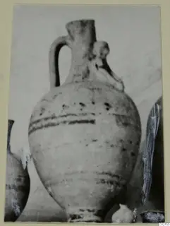 Pottery vessel with a single loop handle and painted bands, Marion Tomb 59 finds