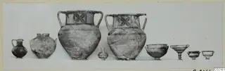 Row of nine pottery vessels, including two large two-handled amphorae with painted panels on the shoulder
