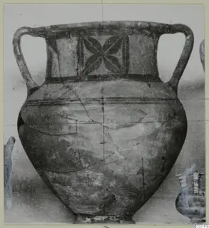 Two-handled painted amphora from Marion, with a four-petalled motif in a panel on the shoulder.