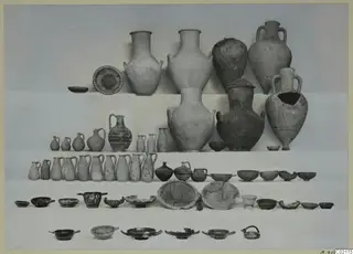 Pottery vessels from Tomb 44 at Marion: jars, jugs, juglets and bowls arranged in rows