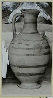 Pottery White Painted VI, a jug with a single strap handle and dark painted bands