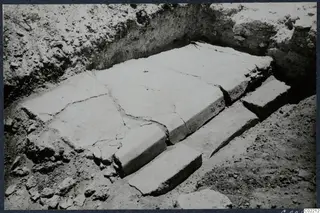 Large stone slabs and steps exposed in an excavation trench at Vouni Palace
