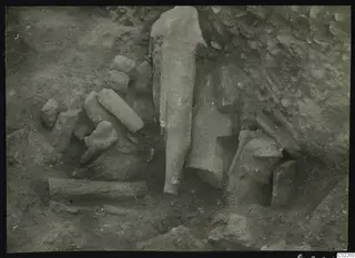 Accumulation of stone statue fragments in an excavation pit at Kition