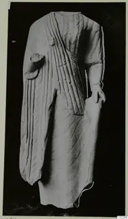 Limestone statue fragment from Vouni: a draped standing figure with the head missing