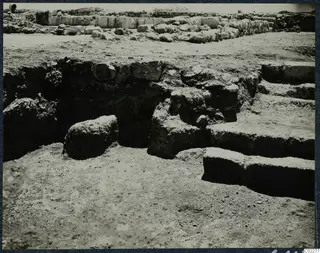 Excavated stone steps and a wall of cut blocks at the palace at Vouni