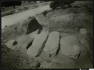 Tomb 22 at Amathus with three large cover slabs lying in an excavated cutting