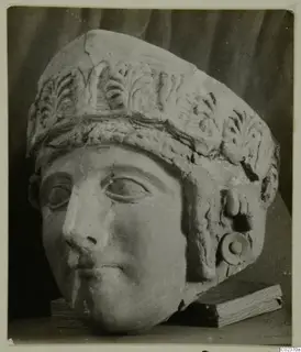 Head sculpture with a high headdress decorated in relief, Terracotta Cypro-Greek II from Vouni