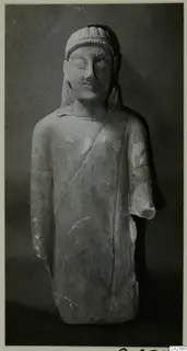 Limestone statue of a standing figure in a long garment, from Kition