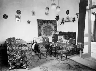 Salon interior at Chocolata's house, Kition, with a patterned sofa, armchair and small tables