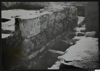 Substructure of the temple at Kition, facade to the north: a long wall of large stone blocks in an excavation
