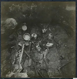 Tomb 18 at Enkomi, tomb chamber with skeletal remains and grave goods during excavation