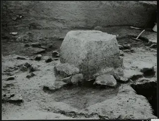 Stone altar block standing in an excavated area at Ayia Irini, seen from the north-east.