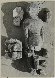 Limestone Cypro-Egyptian statue fragments, with a standing figure and separate heads