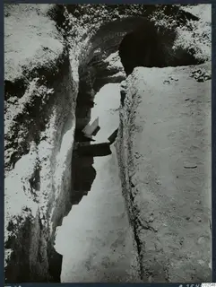 Dromos of Tomb 61 at Marion, a narrow cut passage leading up to the tomb entrance