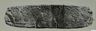 Diadem strip from Enkomi with embossed profile heads and beaded borders, photographed flat