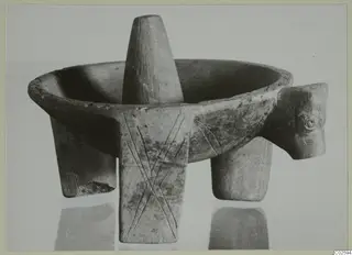 Bowl on three legs with a tall conical post at its centre and an animal head at one side, from Enkomi