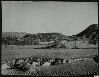 Necropolis hill at Palaeoskoutella, seen from the south across open cultivated ground.
