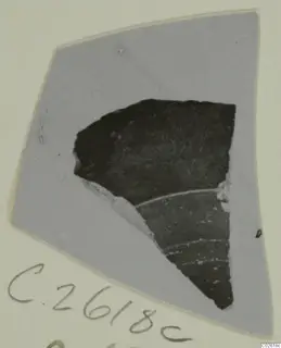 Pottery sherd, Red Lustrous II, shown as a print mounted on a grey card