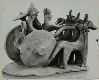 Terracotta group of a two-wheeled vehicle with two riding figures and three harnessed animals, from Ayia Irini