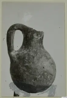 Pottery Red Polished IV jug with a single loop handle, from Ayios Iakovos
