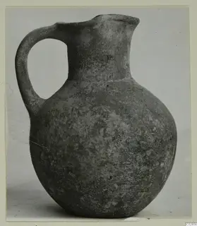 Wheel-made bucchero jug with a single loop handle, Ayios Iakovos find