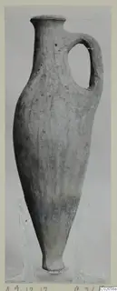 Pottery White Shaved Ware vessel with a tall neck and single loop handle, from Ayios Iakovos