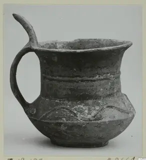 Pottery Base-Ring Ware jug from Enkomi, with a wide mouth and a handle rising above the rim