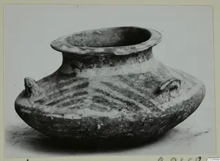 Base-Ring Ware jar with a wide flared rim and two small lug handles, from Ayios Iakovos