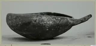 Pottery bowl with a long handle, side view, from Ayios Iakovos.