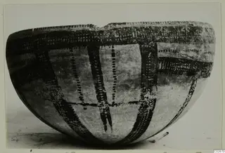 Deep bowl with dark painted bands and dotted decoration, from Ayios Iakovos