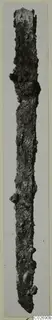 Corroded iron knife from Marion, long and narrow, shown upright