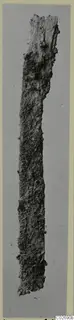 Corroded iron knife blade, long and narrow, from the Marion tomb finds