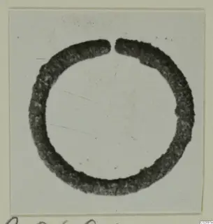 Single open bronze ring from Marion Tomb 85, photographed on a mounted card.