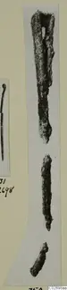 Corroded iron tools from Marion Tomb 9, shown in two photographs on a card mount.