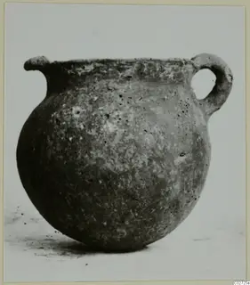 Pottery Red Polished II Bowl from Lapithos, Vrysi tou Barba tombs: a round vessel with one loop handle