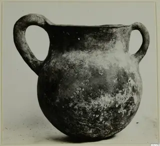 Pottery Red Polished II Bowl from Lapithos, Vrysi tou Barba tombs, with two loop handles and a round body