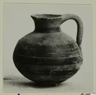 Levanto-Helladic Ware bowl-jar: a round one-handled vessel with dark horizontal bands