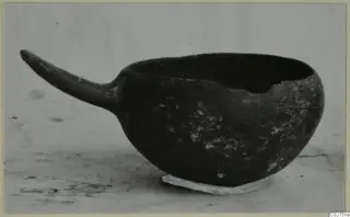 Pottery bowl with a long tapering handle, Red Polished IV ware
