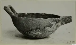 Pottery bowl with a loop handle on one side and a short projecting lip on the other, from Ayios Iakovos