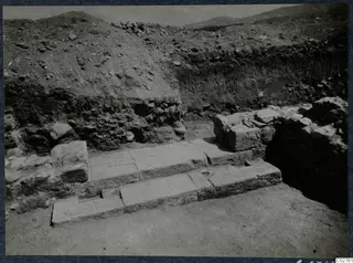 Excavation at Soli, Cholades temples: stone steps of worked blocks cut into a soil bank
