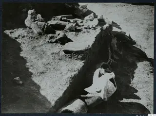 Accumulation of broken statue fragments lying in an excavation at Mersinaki